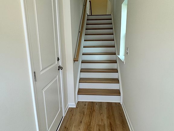 Entrance door view. Left door leads to the garage and upstairs is to the kitchen.