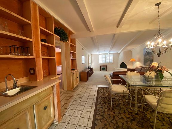 Formal dining seats 6 plus butler's pantry with wet bar