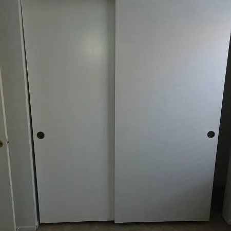 Second bedrooms double door closet.