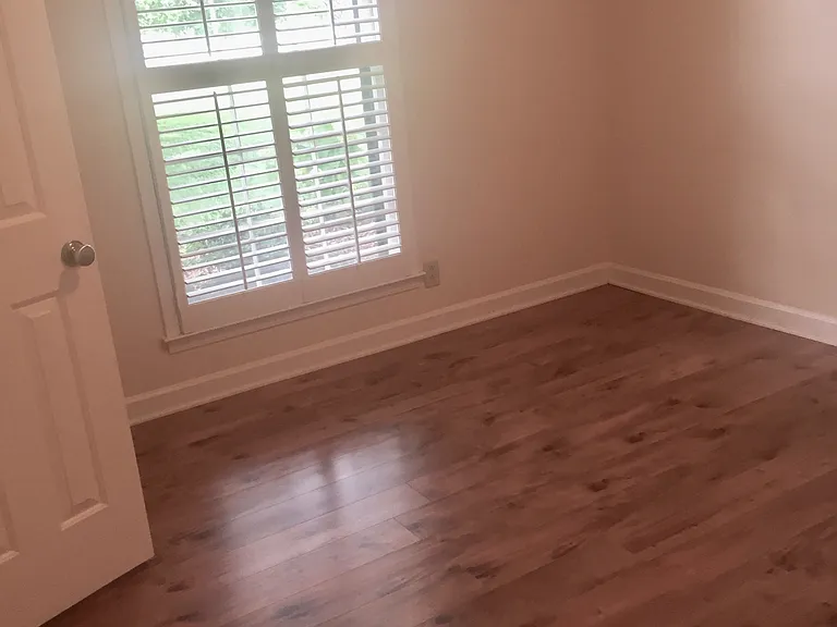 Bedroom 2 with hardwood