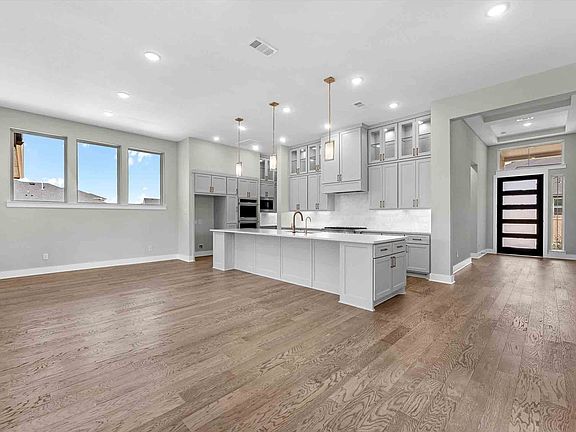 1203 River Glen Cove Carignan Plan Foyer Kitchen