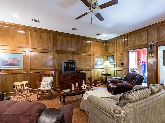 Another view of the living room.  The door to the left in the picture leads to a the sun room which has a dry sauna and can also be used as an exercise room or another living area.