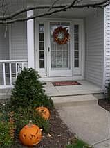 Welcoming Cozy Covered Front Porch