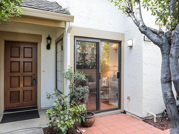Front entrance and sliding door for patio area.