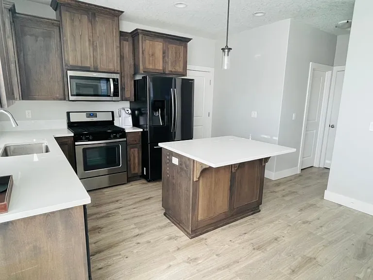 Walk-in pantry and bathroom doors to the right