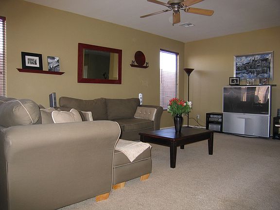 Spacious bright & open Great Room. Upgraded carpet & tile, dramatic 9'ceilings