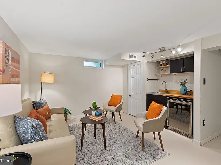 Bonus 408 Sq. Ft. Basement space with Bar fridge and sink.