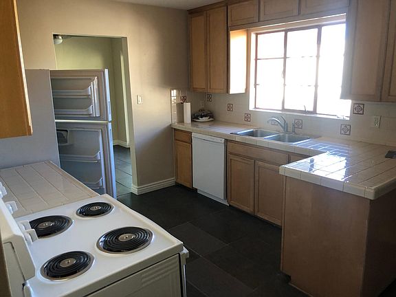 Kitchen showing new Stove and Dishwasher