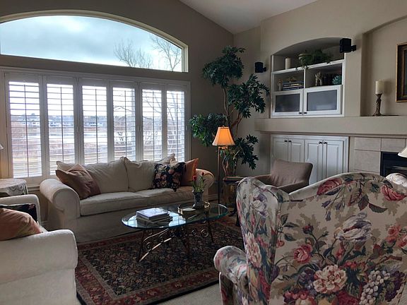 Living room area on main floor with view and gas fireplace.