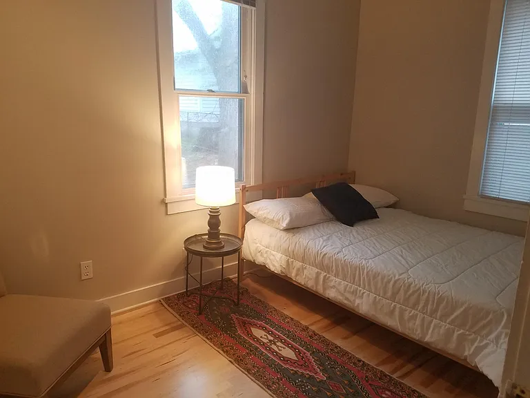 The larger North East bedroom has a walk in closet.
