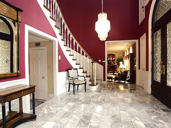 FOYER...Gracious two story foyer will meet your guest. Italian marble floors , recessed lighting, an