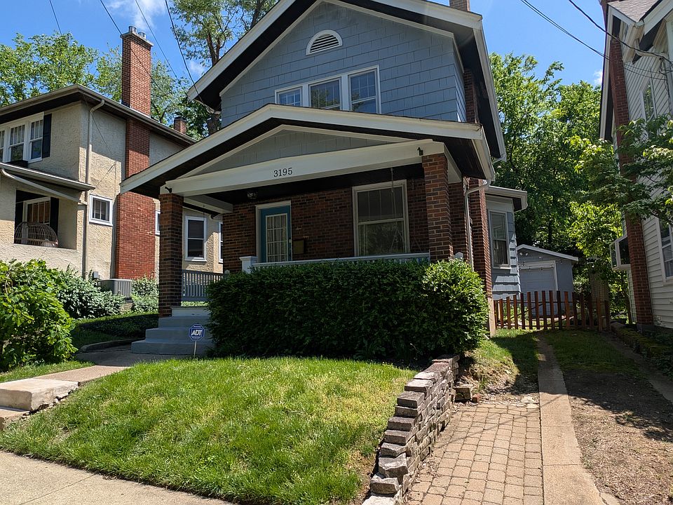 Front view with driveway