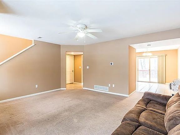 Living room looking into kitchen