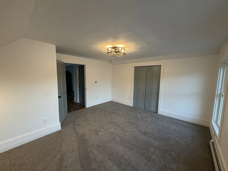 Taken from the corner where you bed will be. One of two windows to the right. Then to the center is the big walk-in closet. And to the left is the main room.