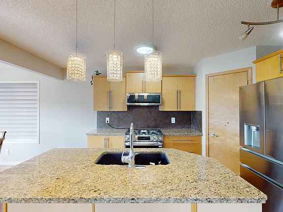 5th image of 396 Kincora Dr NW