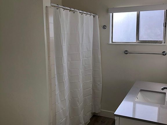 Full bath has tub / shower combo.