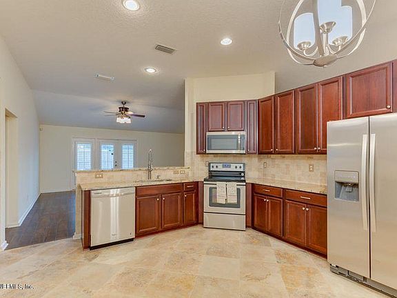 5th image of 9575 Woodstone Mill Dr