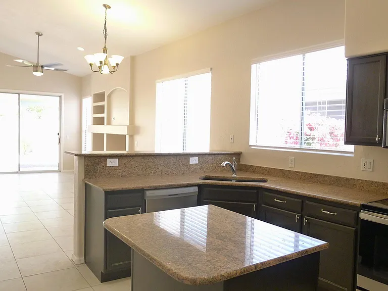 Kitchen with granite countertops and new appliances