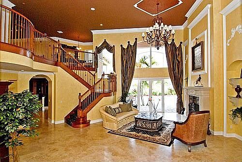 Living Room with Stone & Marble Fireplace
