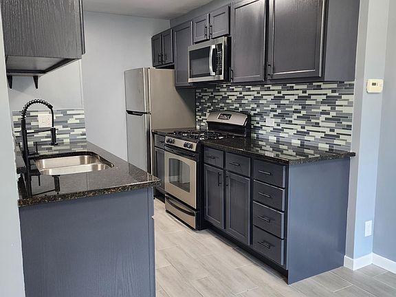 Galley-style kitchen, completely renovated