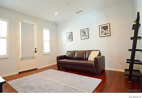 Living room. Door to private patio