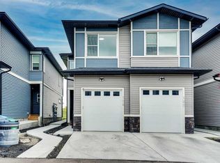 116 Saddlestone Heath NE #106, Calgary, AB T3J5K8