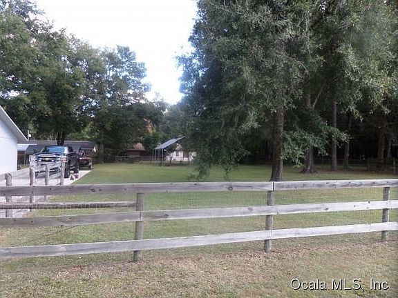 Large fenced double lot