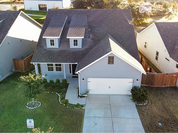 House is very close to fitness center, pool, and lake