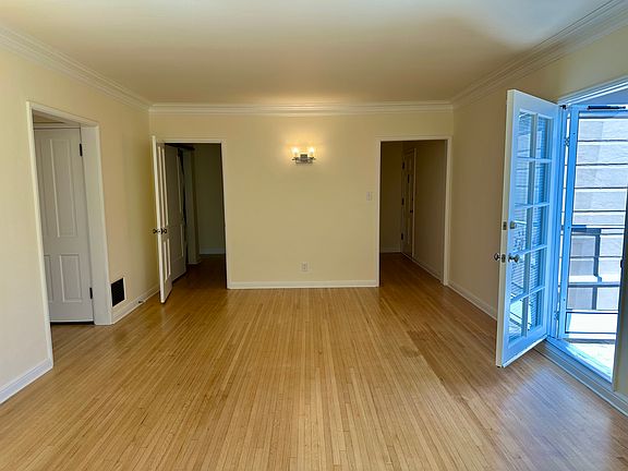 Living area 2 - Facing entryway, balcony door