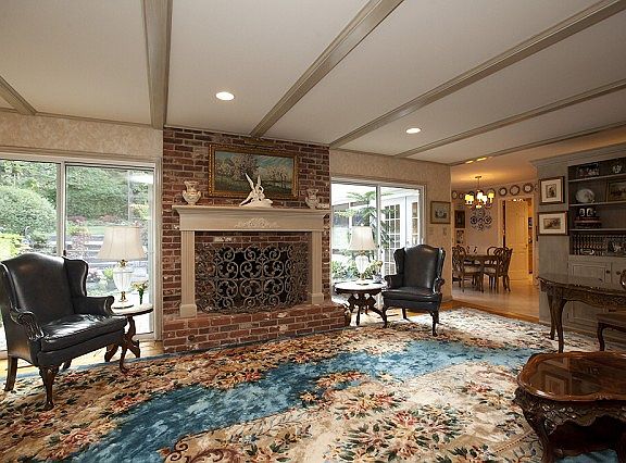 Huge family room with beam ceiling