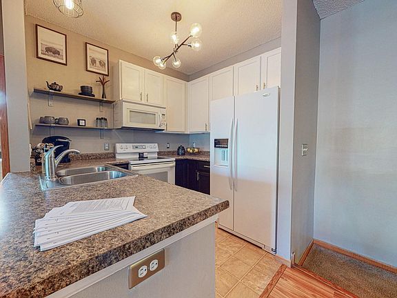 2nd image of 14700 Cobalt St NW Unit 36