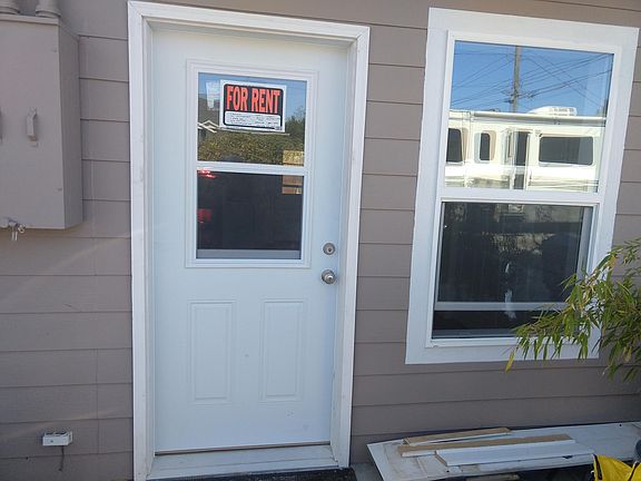 front door and 1 parking spot