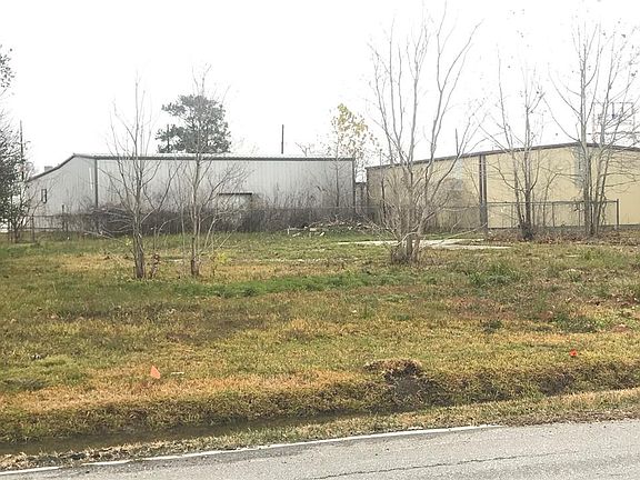 Large lot in the heart of Crosby. Perfect to build a new home or business. The white metal building is a auto body shop and is also for sale by the same seller.