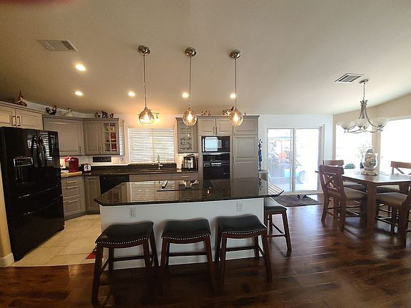 Kitchen, island and dining