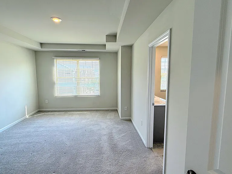 Bright Master bedroom with bathroom
