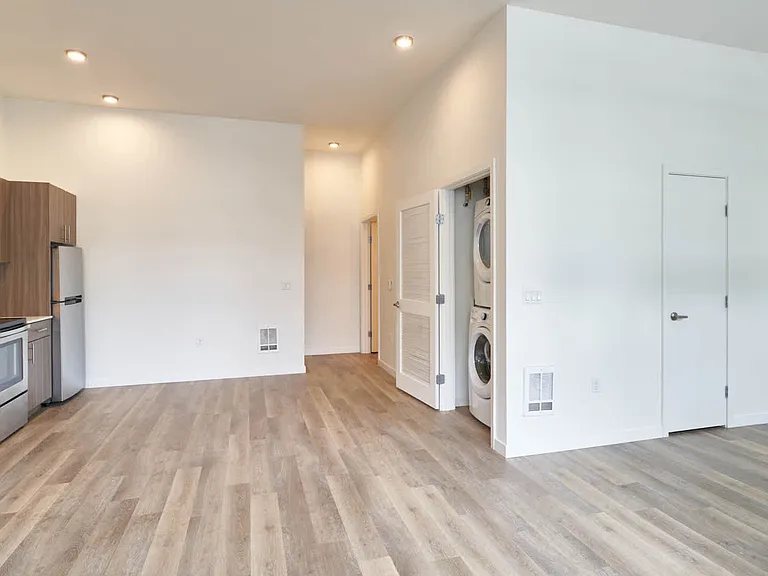 Kitchen with In-home Washer and Dryer