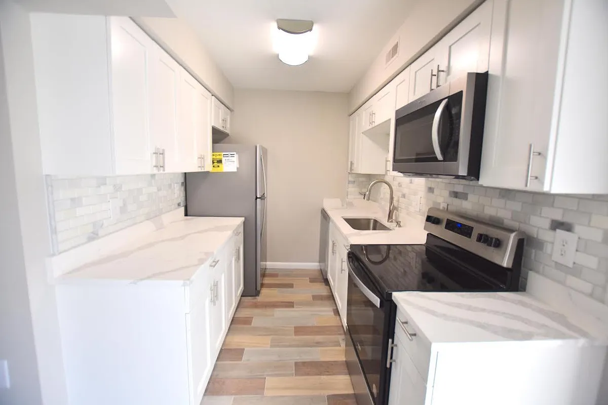 Building Photo - 5975 Burroughs Ave #1