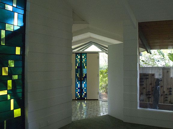 STAINED GLASS IN EAST WALL AND FRONT DOORS