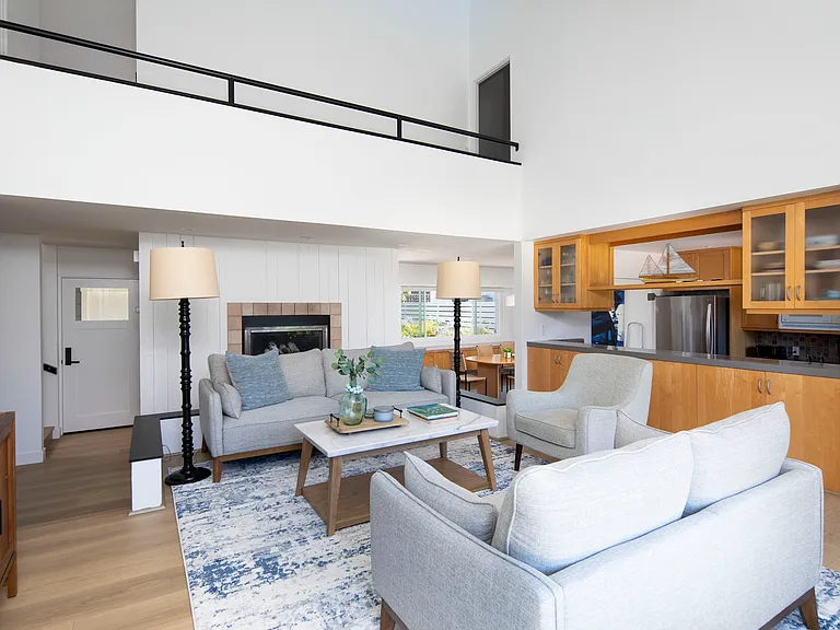 Family room - new furnishings, TV and hard wood floors!