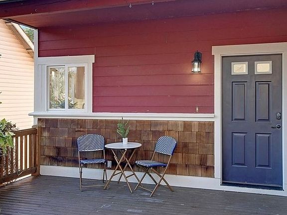 Spacious fenced front porch