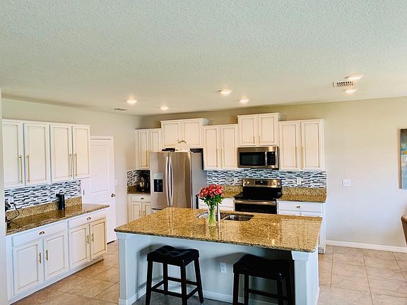 Less than 1 year new all stainless steel appliances.