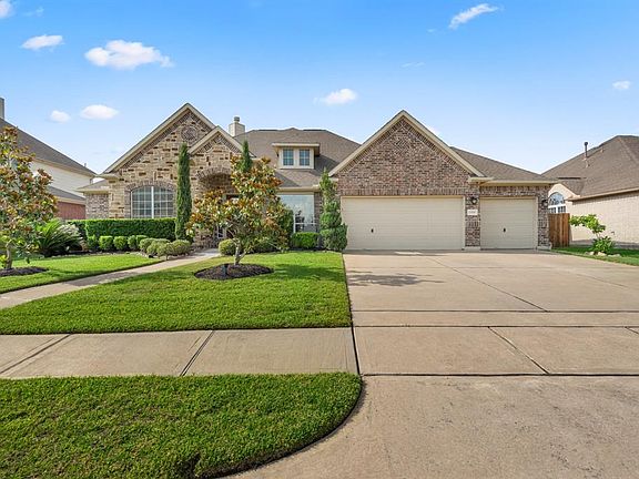 Not only do you have the 3 car wide garage, but the driveway is oversized as well. What a rare find!