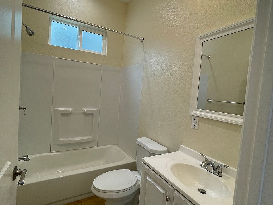 Full bathroom with tub and shower