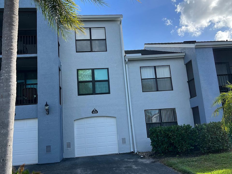 Ground floor condo with attached large one car garage and long private driveway