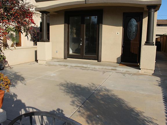 French doors from the formal living area to the front patio