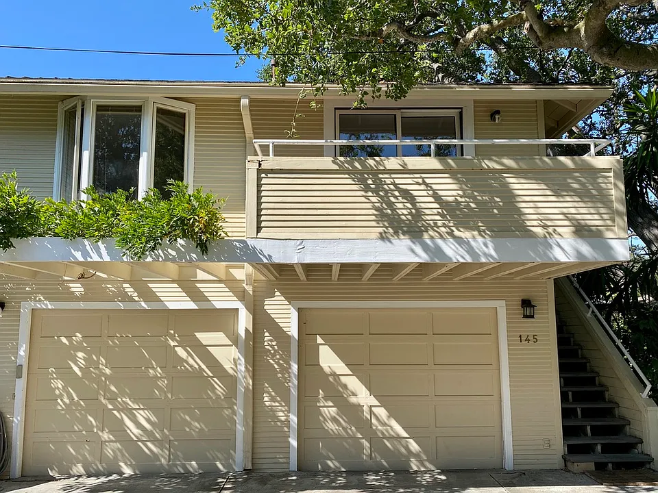 Apartment has great sunny exposure next to a majestic oak tree
