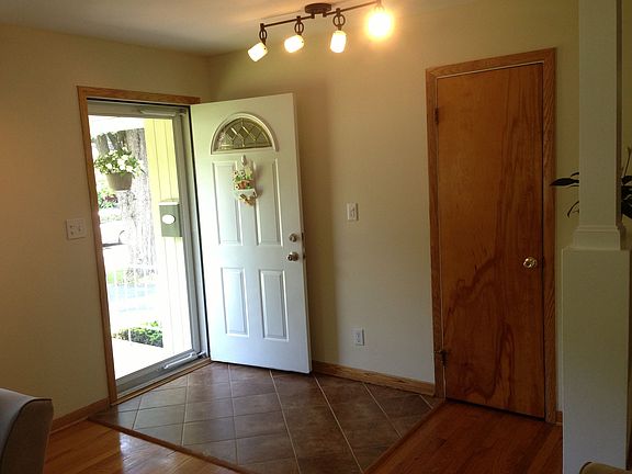 New Porcelain Tile Entry & Storm Door