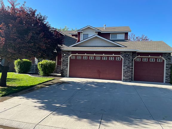 3-car garage with built-in storage racks for organized, efficient storage