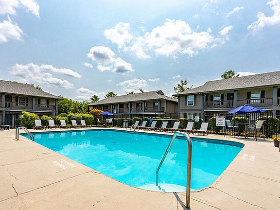 Refreshing Swimming Pool and Lounge Area at The Commons Student Apartments in Oxford, OH