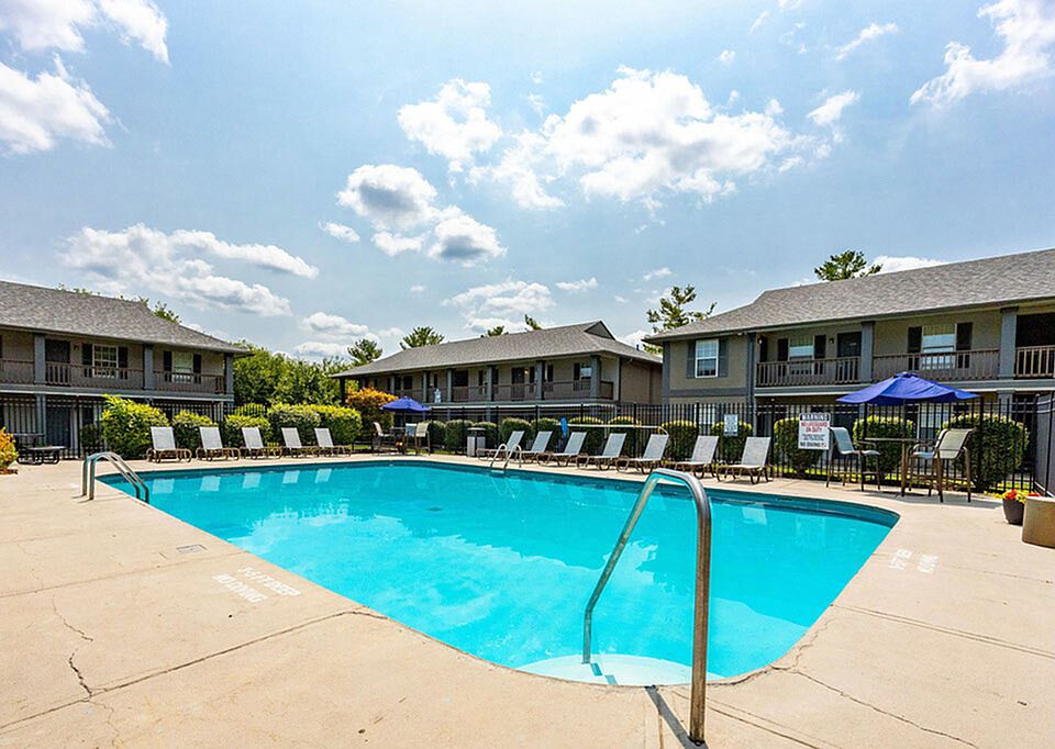 Refreshing Swimming Pool and Lounge Area at The Commons Student Apartments in Oxford, OH